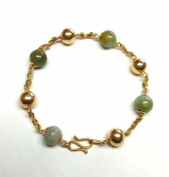 Bracelet en or rose et perles de jade