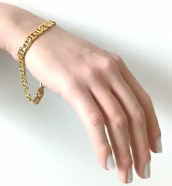 Bracelet gourmette en or jaune, maille marine battue