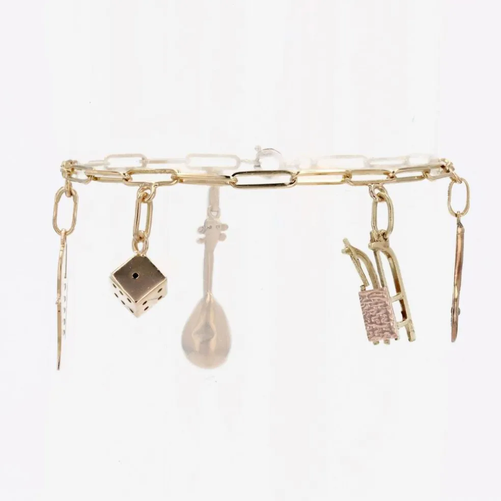 Bracelet gourmette or jaune et ses breloques