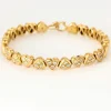 Bracelet jonc "Cœurs" en or jaune et diamants