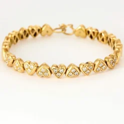 Bracelet jonc "Cœurs" en or jaune et diamants