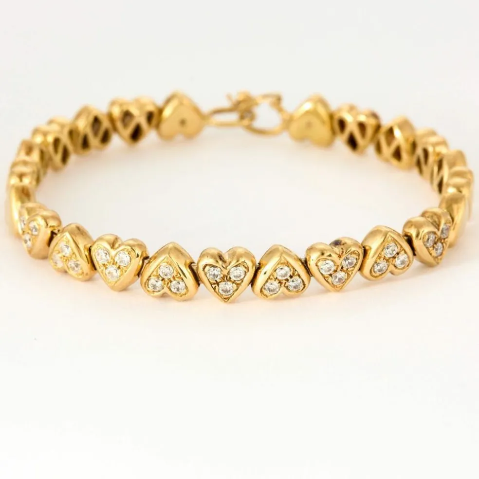 Bracelet jonc "Cœurs" en or jaune et diamants