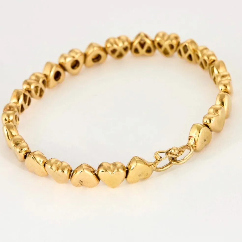 Bracelet jonc "Cœurs" en or jaune et diamants