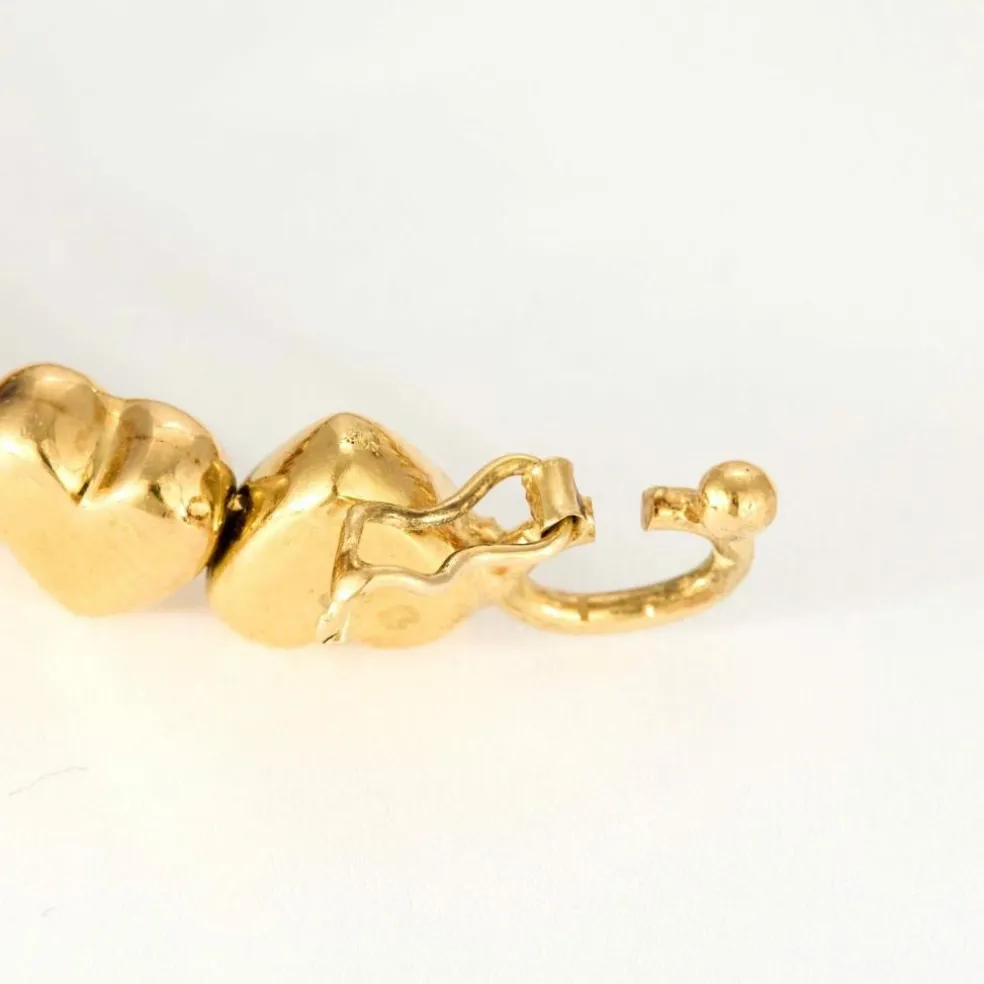 Bracelet jonc "Cœurs" en or jaune et diamants