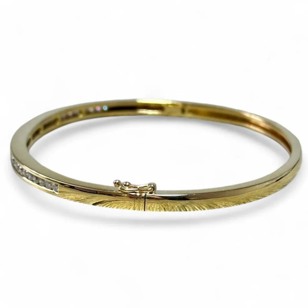 Bracelet jonc diamants sertis rail