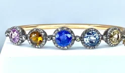 Bracelet jonc en or 18 carats, multipierres : saphir, topazes, citrine. Epoque Napoléon III.