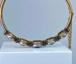 Bracelet jonc en or 18 carats, multipierres : saphir, topazes, citrine. Epoque Napoléon III.