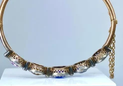 Bracelet jonc en or 18 carats, multipierres : saphir, topazes, citrine. Epoque Napoléon III.