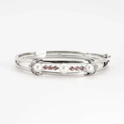 Bracelet jonc en or gris ajouré de perles de culture et diamants