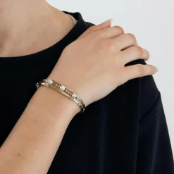 Bracelet jonc en or gris ajouré de perles de culture et diamants