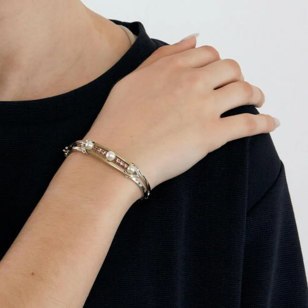 Bracelet jonc en or gris ajouré de perles de culture et diamants
