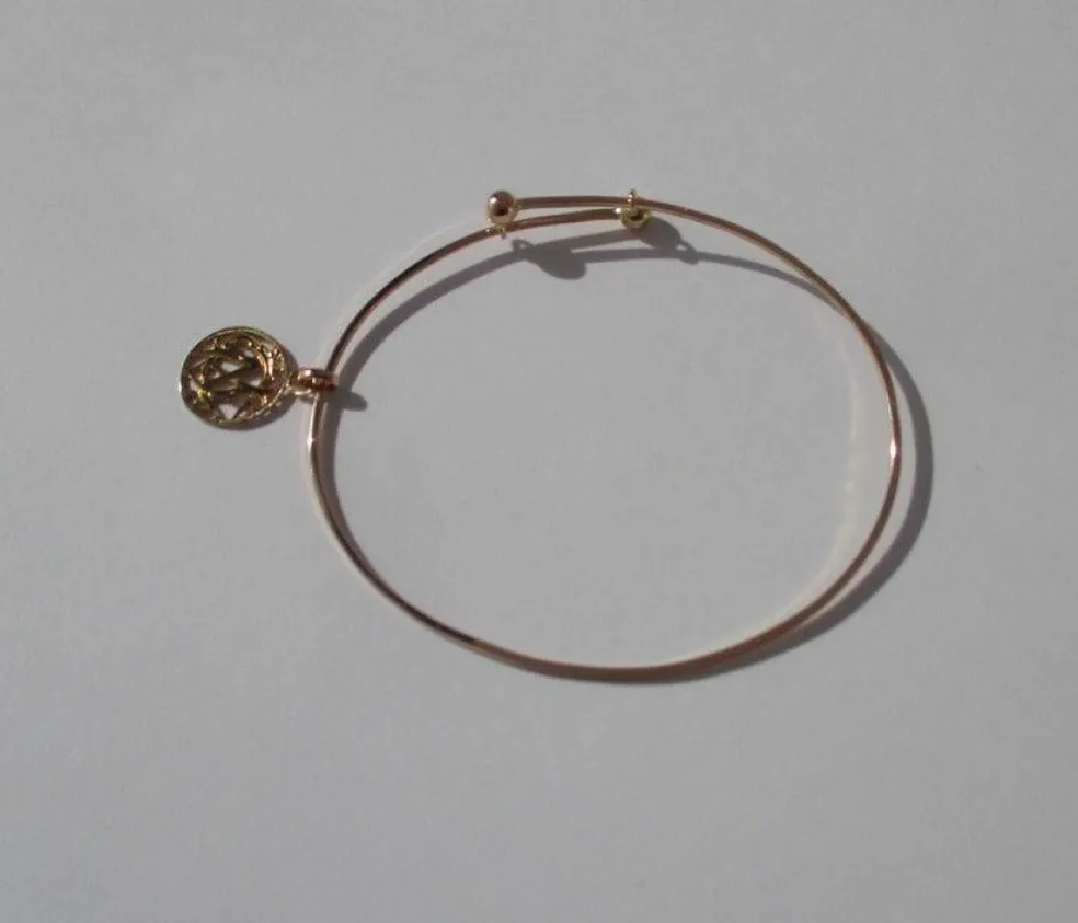 Bracelet jonc et pendentif monogramme CM en or rose