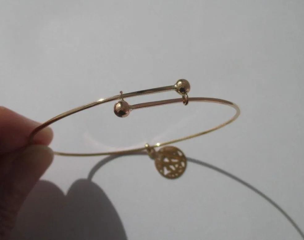 Bracelet jonc et pendentif monogramme CM en or rose