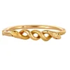 Bracelet jonc motif serpent en or jaune et rubis