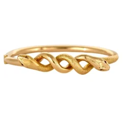 Bracelet jonc motif serpent en or jaune et rubis