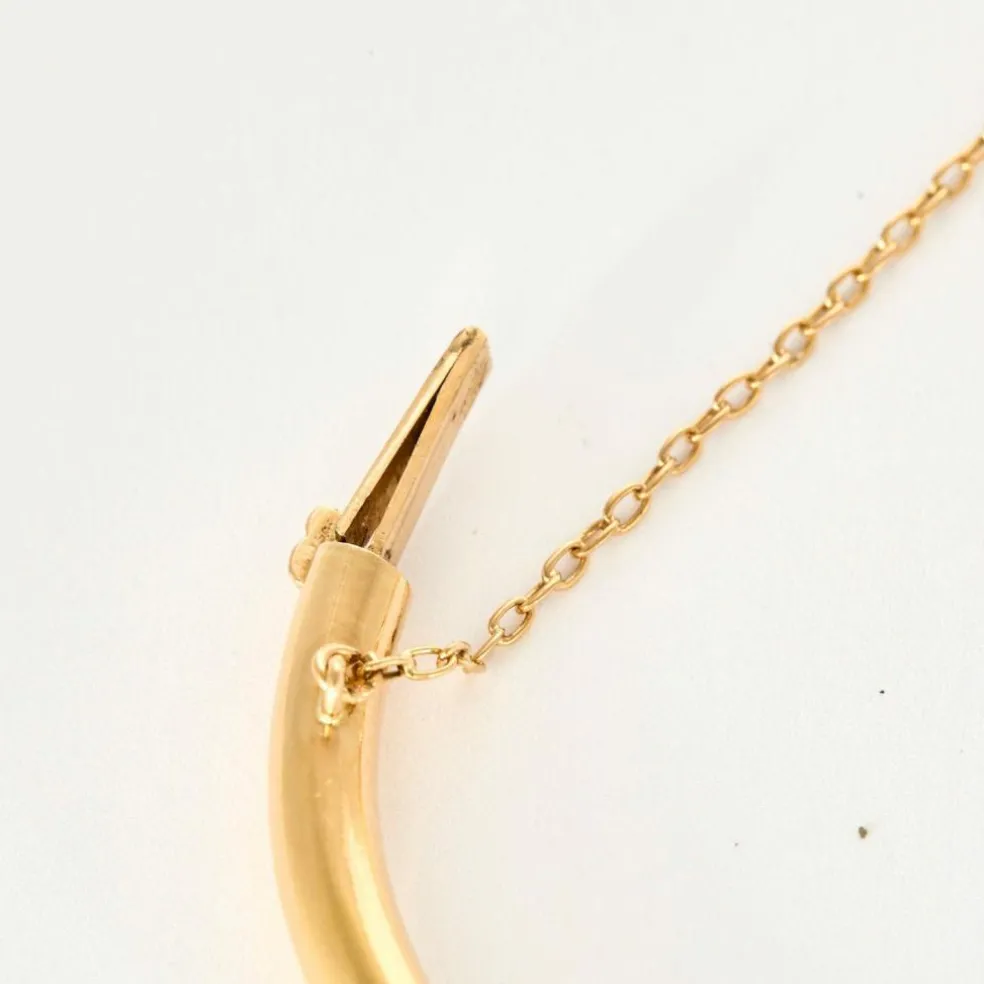Bracelet jonc motif serpent en or jaune et rubis