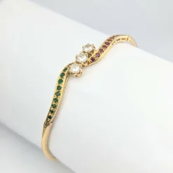 Bracelet jonc or jaune, diamants, rubis, émeraudes