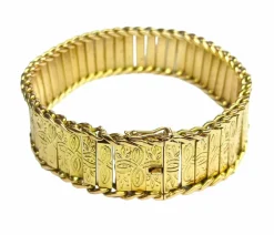 Bracelet manchette en or jaune à décor floral