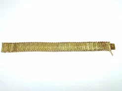 Bracelet manchette en or jaune à décor floral