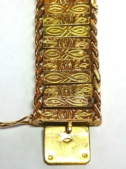 Bracelet manchette en or jaune à décor floral