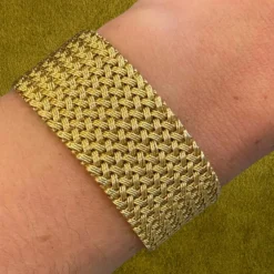 Bracelet Manchette mailles tressées en or jaune 18 carats