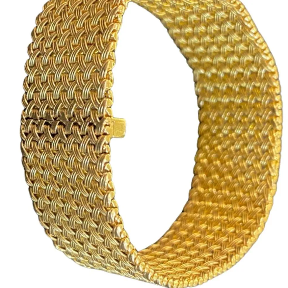 Bracelet Manchette mailles tressées en or jaune 18 carats