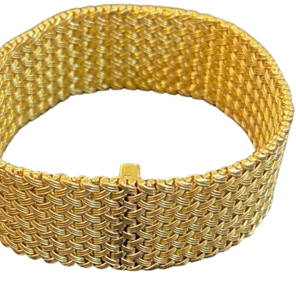 Bracelet Manchette mailles tressées en or jaune 18 carats