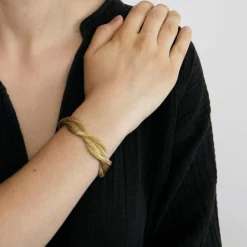 Bracelet manchette tressé en maille tissée or jaune