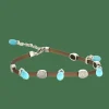 BRACELET OR BLANC, DIAMANTS ET TURQUOISE.