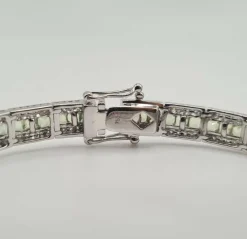 Bracelet or blanc, diamants et saphirs multi-couleurs