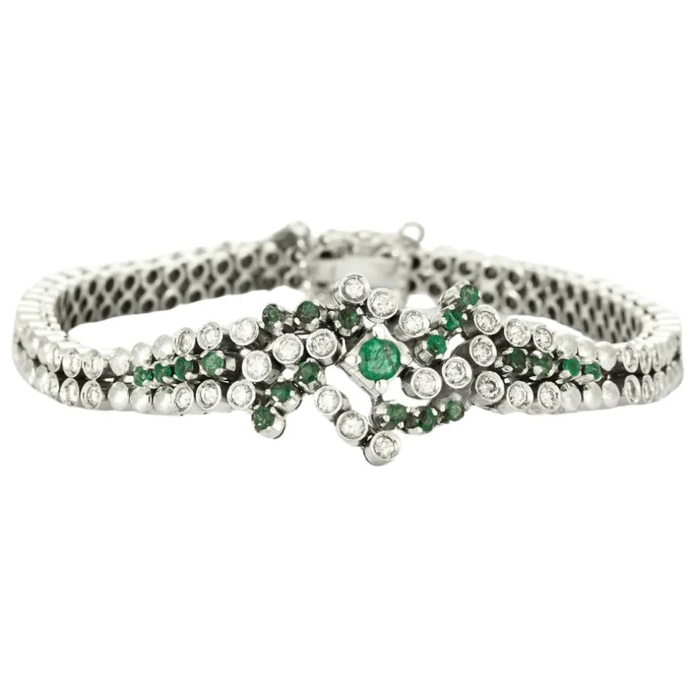 Bracelet or gris diamants et émeraudes