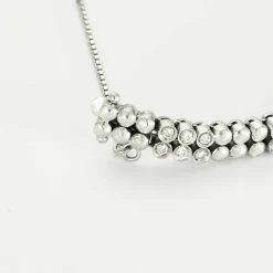 Bracelet or gris diamants et émeraudes