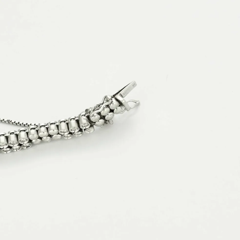 Bracelet or gris diamants et émeraudes