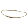 Bracelet or jaune 18 carats serti d’une barrette de diamants
