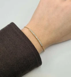 Bracelet or jaune 18 carats serti d’une barrette de diamants