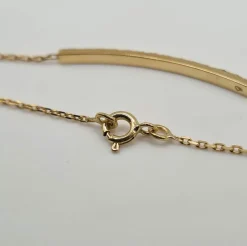 Bracelet or jaune 18 carats serti d’une barrette de diamants