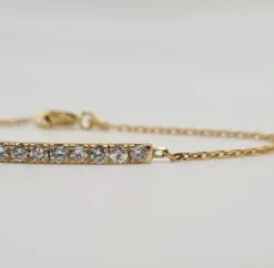 Bracelet or jaune 18 carats serti d’une barrette de diamants