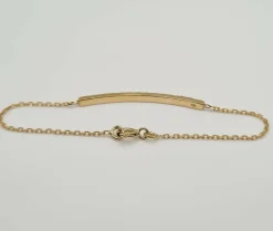 Bracelet or jaune 18 carats serti d’une barrette de diamants
