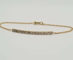 Bracelet or jaune 18 carats serti d’une barrette de diamants