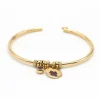 Bracelet or jaune, diamants et rubis