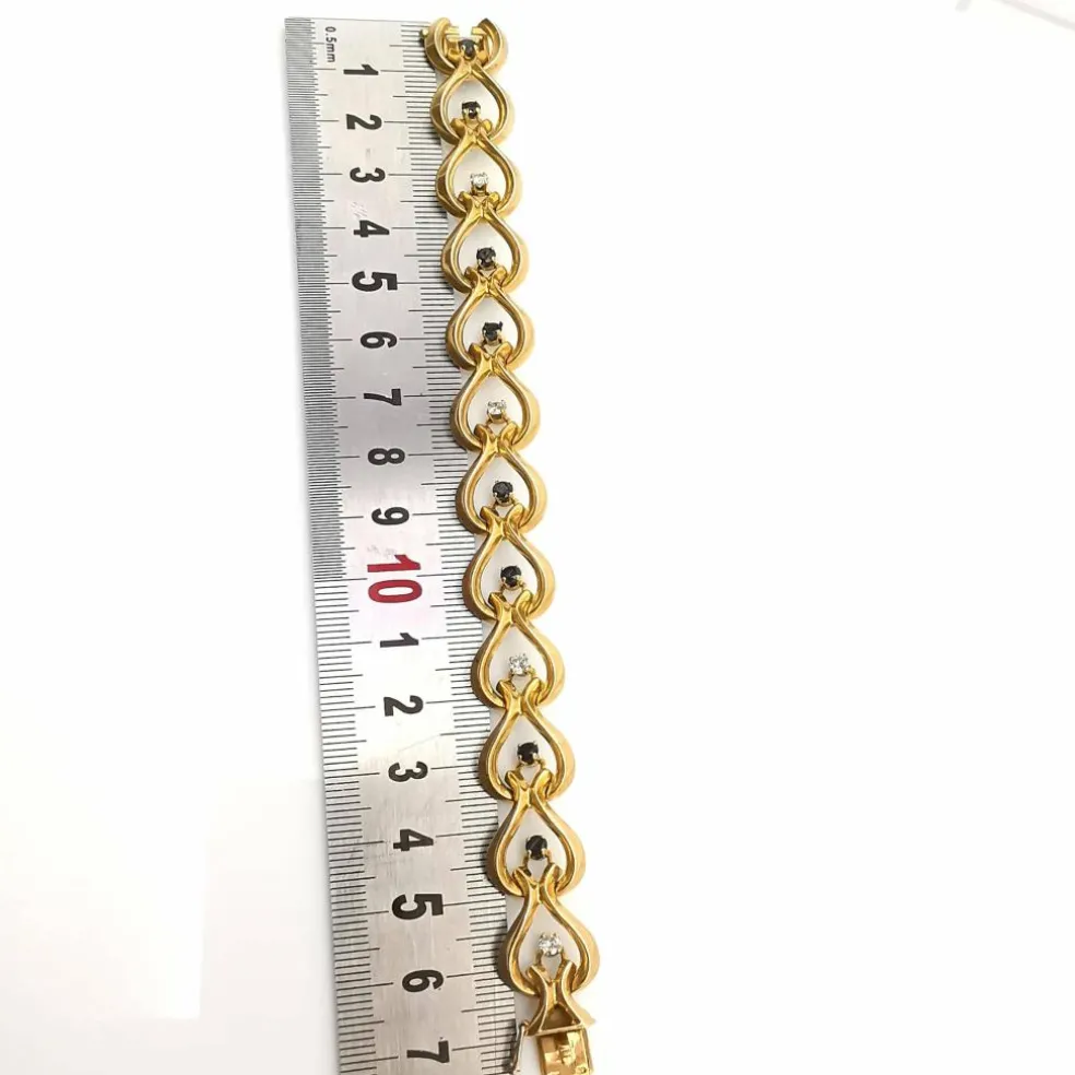 Bracelet or jaune diamants et saphirs