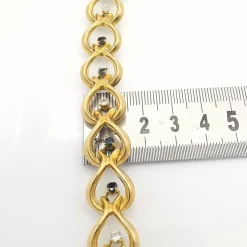 Bracelet or jaune diamants et saphirs
