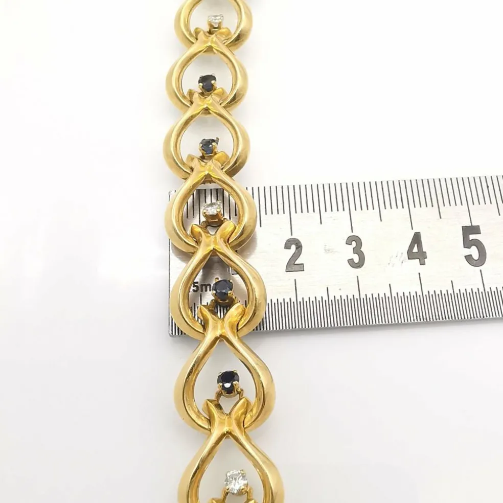Bracelet or jaune diamants et saphirs