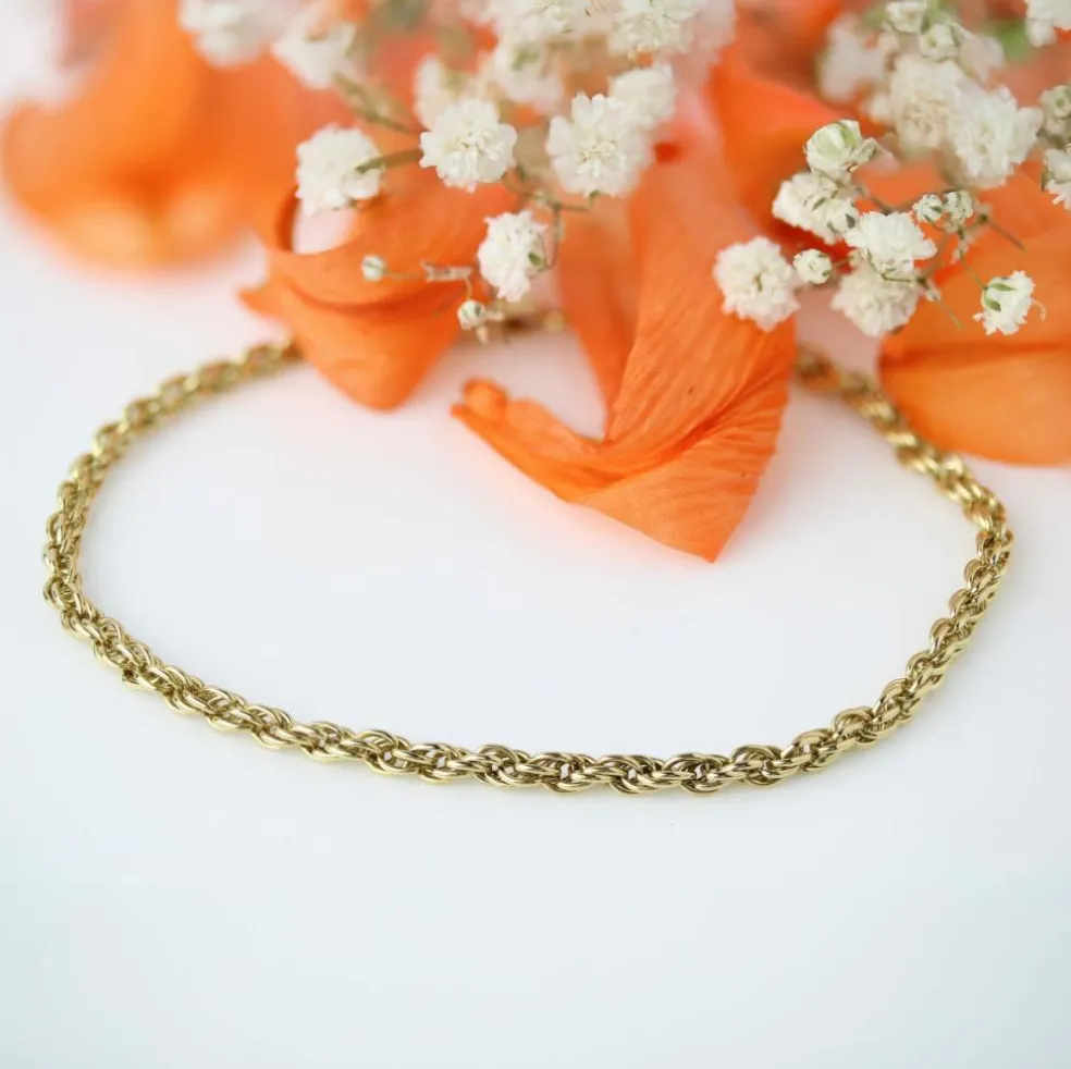 Bracelet or jaune maillons torsadés