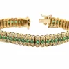 Bracelet or jaune, émeraudes et diamants