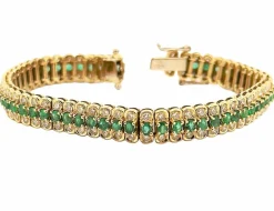 Bracelet or jaune, émeraudes et diamants