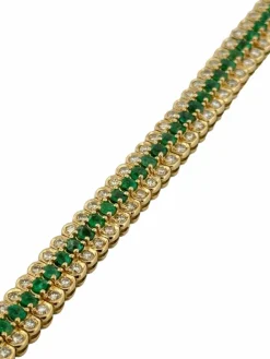 Bracelet or jaune, émeraudes et diamants
