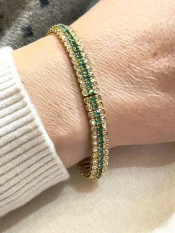 Bracelet or jaune, émeraudes et diamants