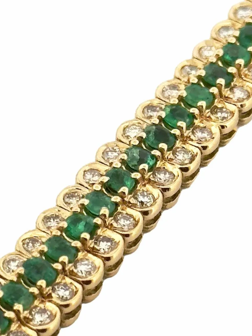 Bracelet or jaune, émeraudes et diamants