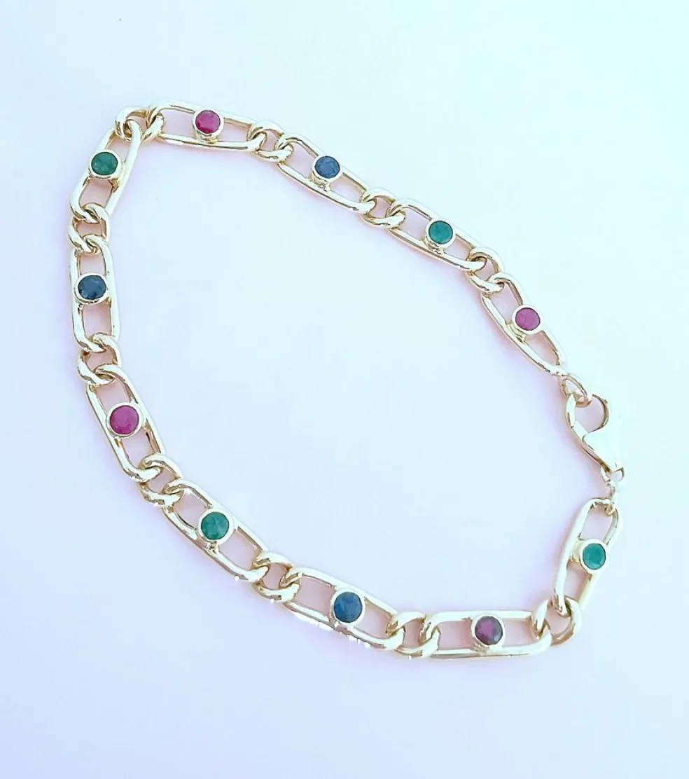 Bracelet or jaune émeraudes rubis saphirs